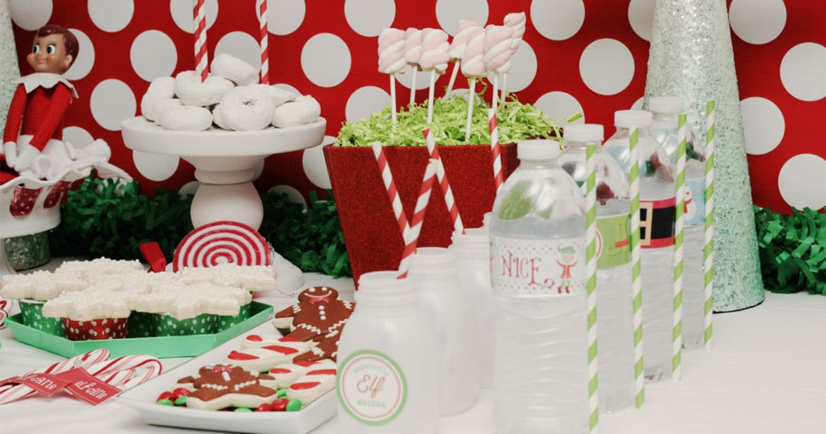 Christmas party decor with DIY water bottle label printables: naughty/nice, Santa's jacket and belt, and more