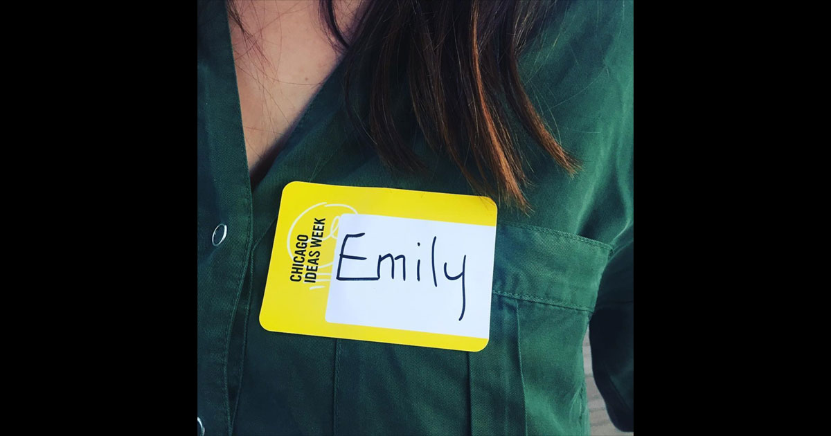 Name tag example, pulled from @hellomypodcast: bright yellow name tag sticker with event name printed and handwritten guest name