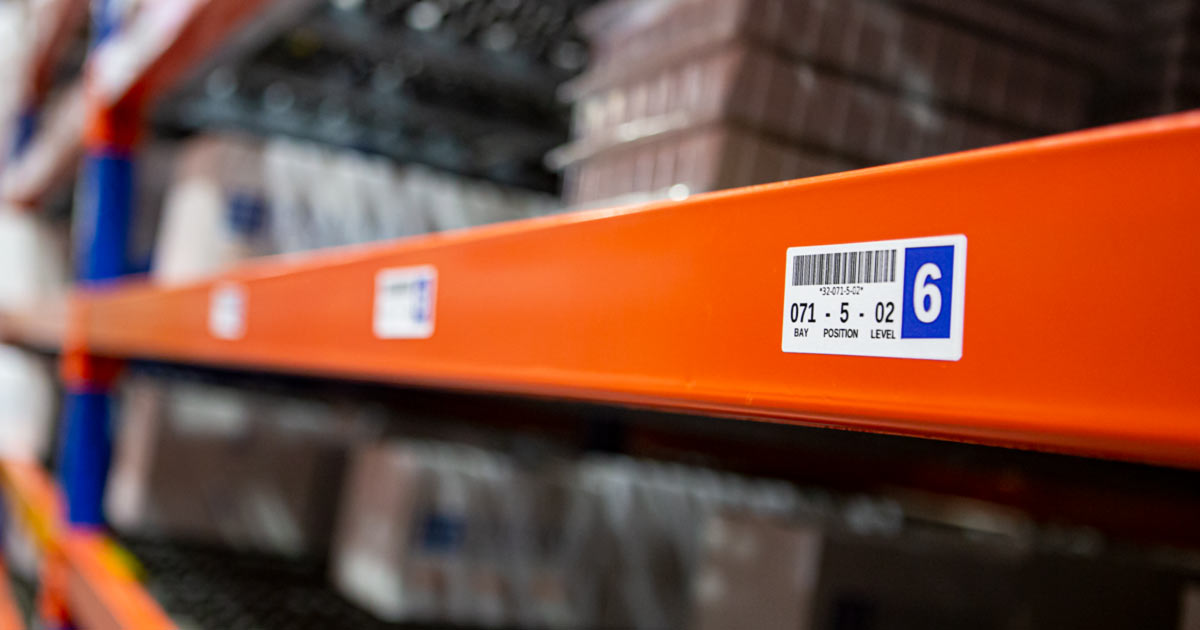 Warehouse inventory organization label on a shelf