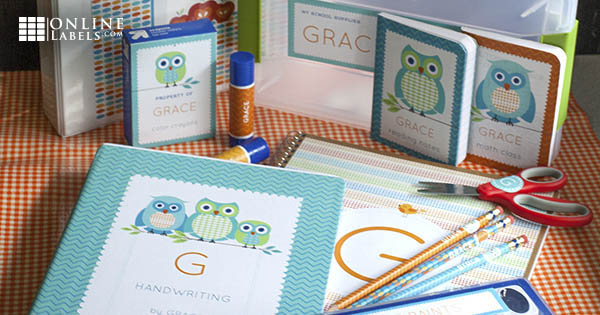 Various school supplies with owl themed labels