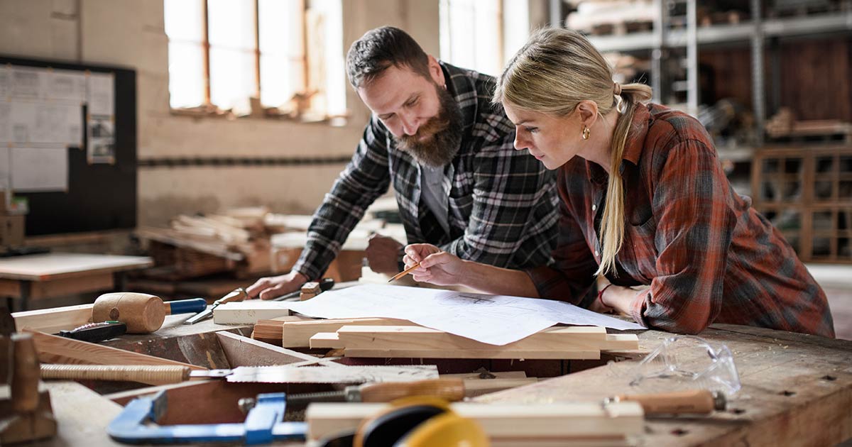 Man and woman working on a project