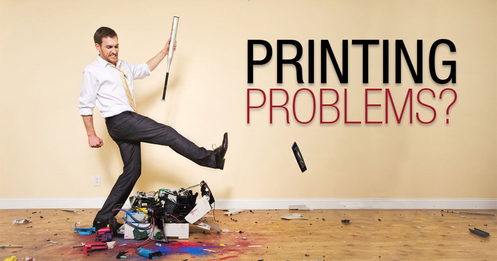Man destroying printer after difficulty printing