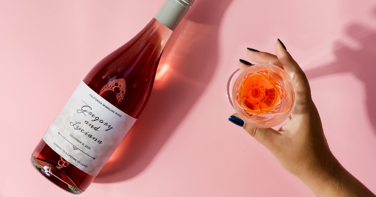 Pink wine bottle label with elegant wedding party favor label